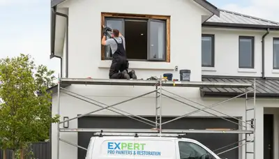 Professional wood rot repair on home siding by painters in Bloomington, IN